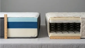 Side by side cross section of foam and spring mattresses showing structural differences for cleaning.